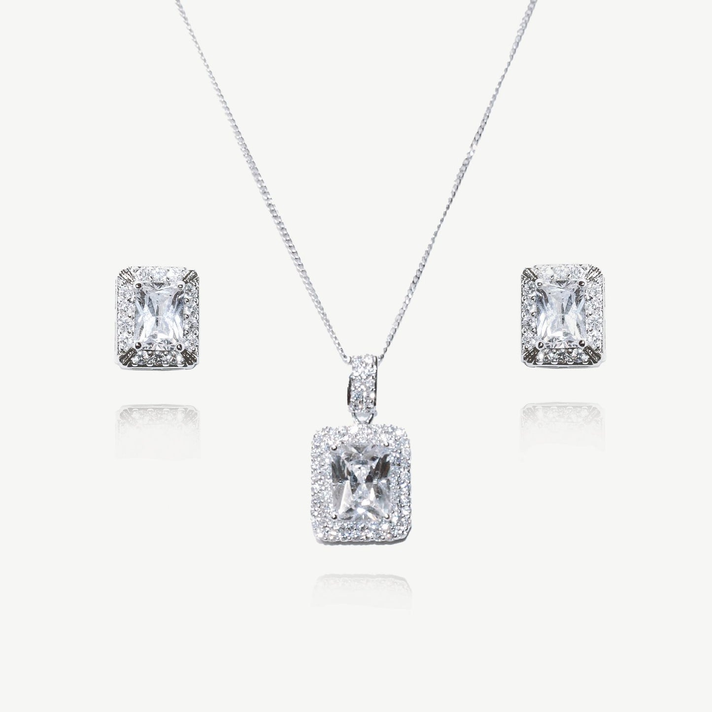 ART DECO RHODIUM CRYSTAL EMERALD CUT PROM SET